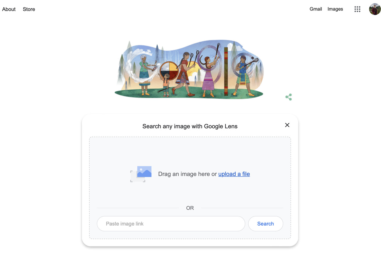 Screenshot of the Google homepage, showing the search image with Lens box.